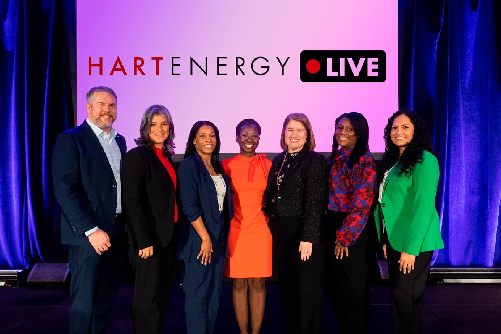 Speakers on stage at a Hart Energy LIVE event